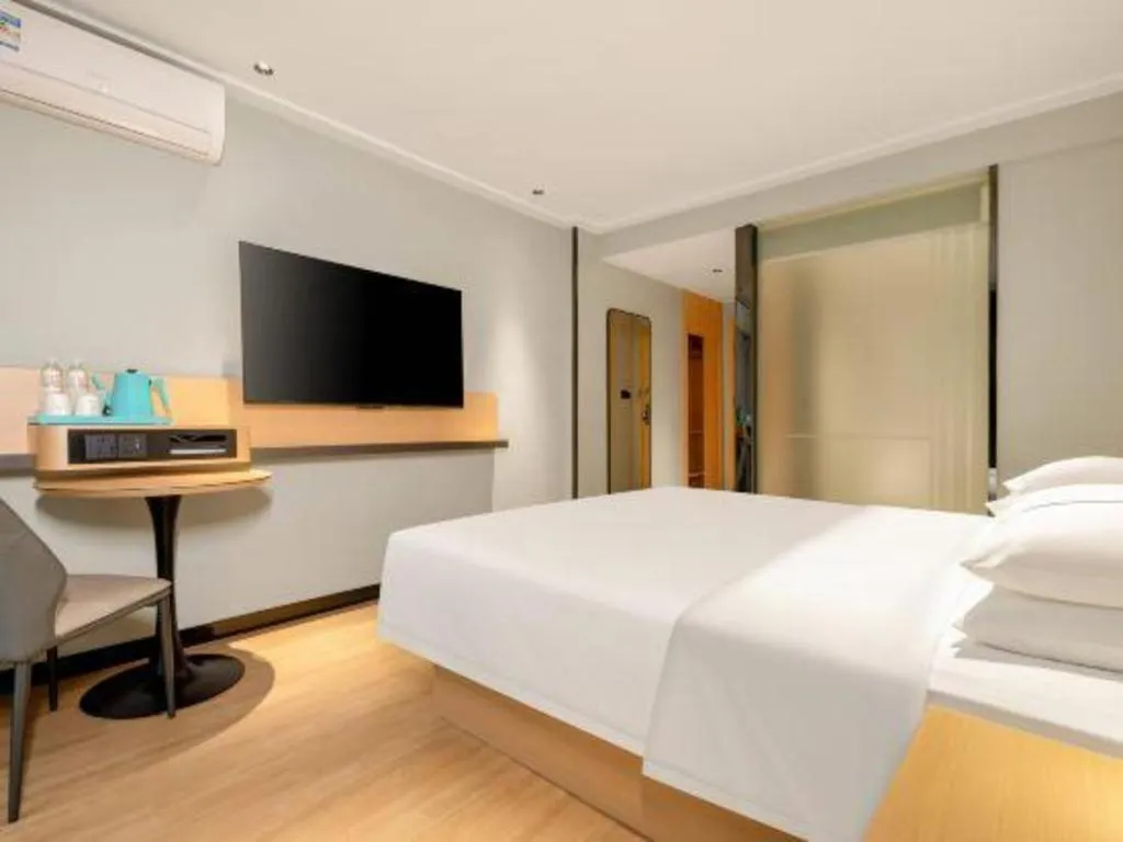 Bed in City Comfort Inn Hechi Chengxi Avenue