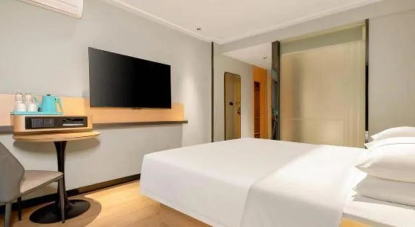 Bed in City Comfort Inn Hechi Chengxi Avenue