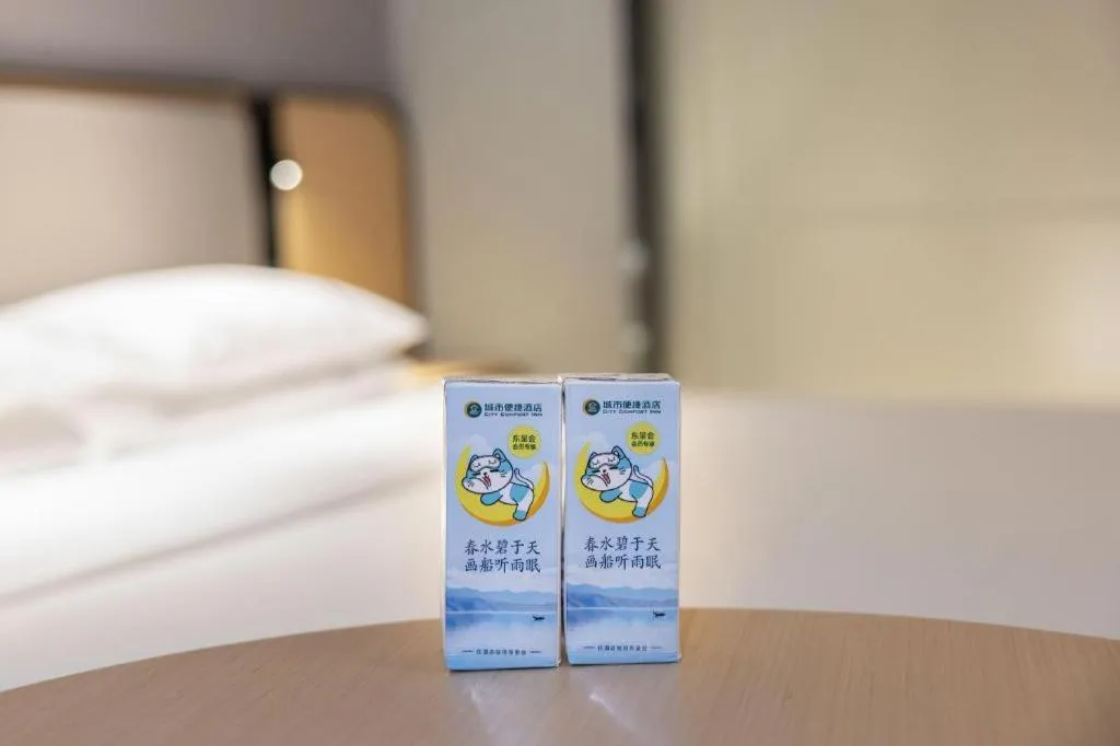 Bed in City Comfort Inn Hechi Chengxi Avenue