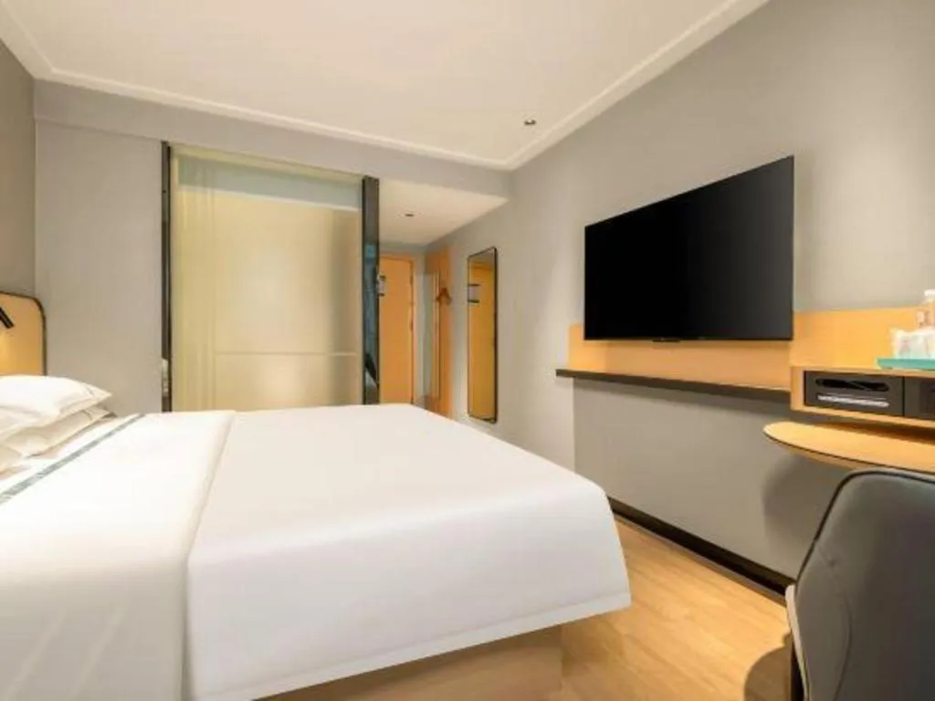 Bed in City Comfort Inn Hechi Chengxi Avenue