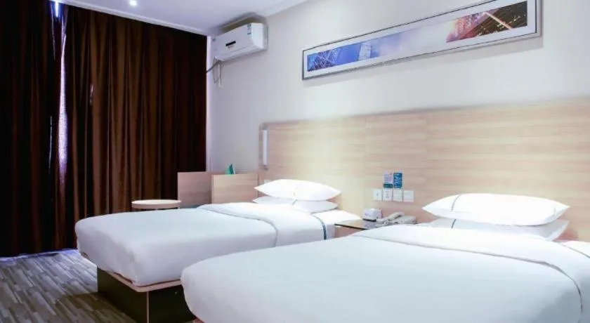 Bed in City Comfort Inn Tianmen East Lake Wanda Plaza