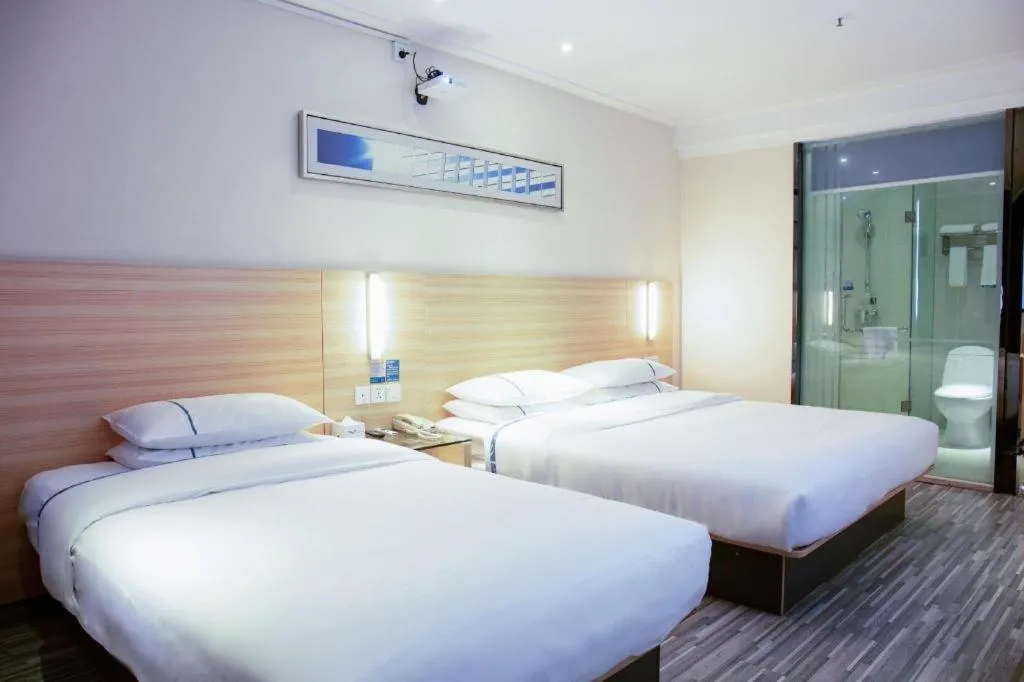 Bed in City Comfort Inn Tianmen East Lake Wanda Plaza