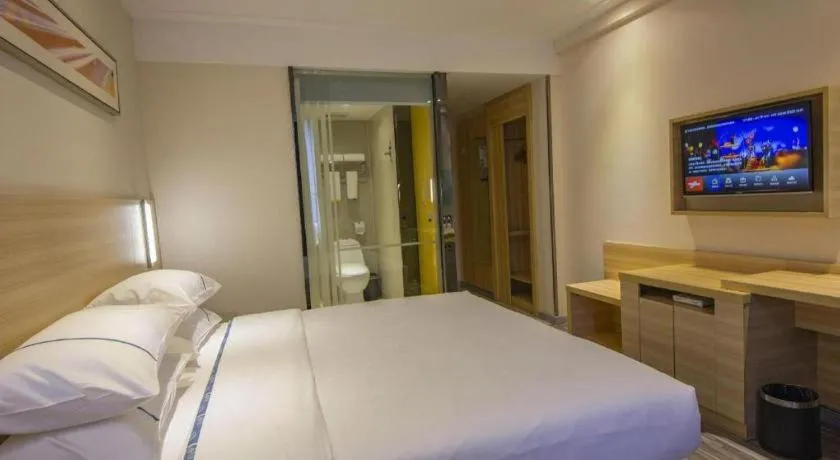 Bed in City Comfort Inn Zhongshan Xiaolan Xinduhui Gymnasium