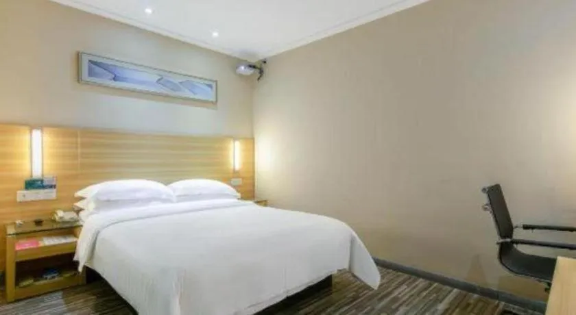 Bed in City Comfort Inn Zhongshan Xiaolan Xinduhui Gymnasium