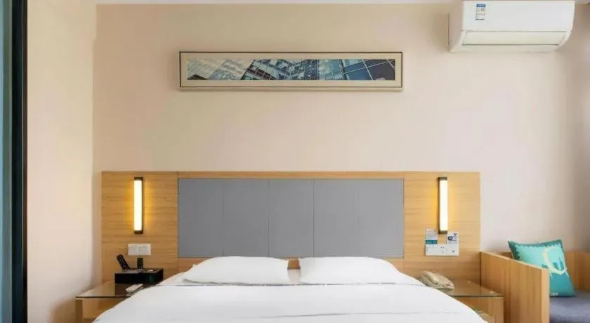 Bed in City Comfort Inn Zhongshan Xiaolan Xinduhui Gymnasium