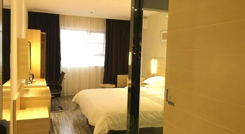 Bed in City Comfort Inn Zhongshan Xiaolan Xinduhui Gymnasium