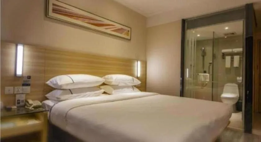 Bed in City Comfort Inn Zhongshan Xiaolan Xinduhui Gymnasium