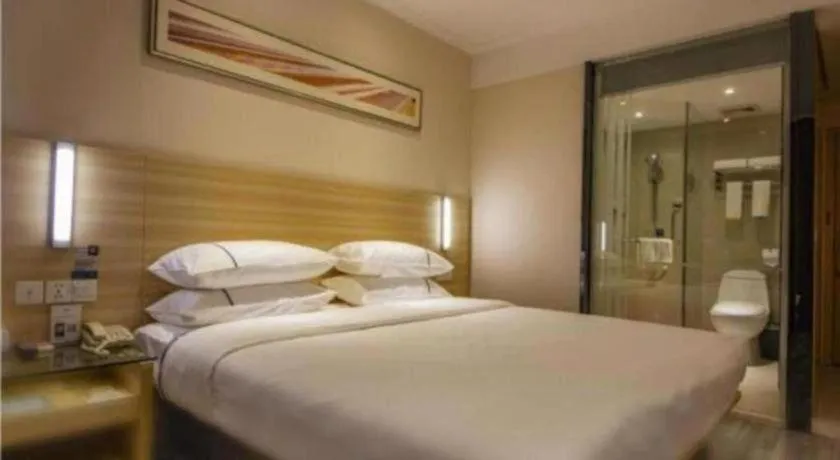 Bed in City Comfort Inn Zhongshan Xiaolan Xinduhui Gymnasium