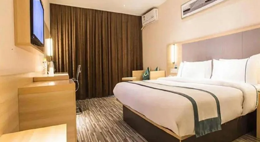 Bed in City Comfort Inn Zhongshan Xiaolan Xinduhui Gymnasium