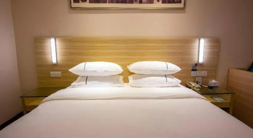 Bed in City Comfort Inn Zhongshan Xiaolan Xinduhui Gymnasium