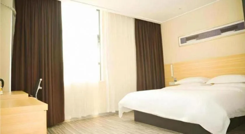 Bed in City Comfort Inn Zhongshan Xiaolan Xinduhui Gymnasium