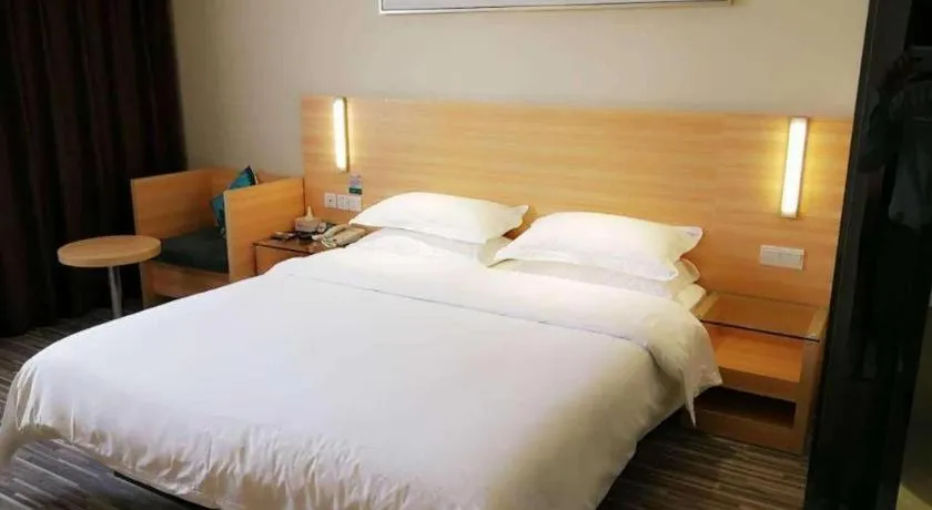 Bed in City Comfort Inn Zhongshan Xiaolan Xinduhui Gymnasium