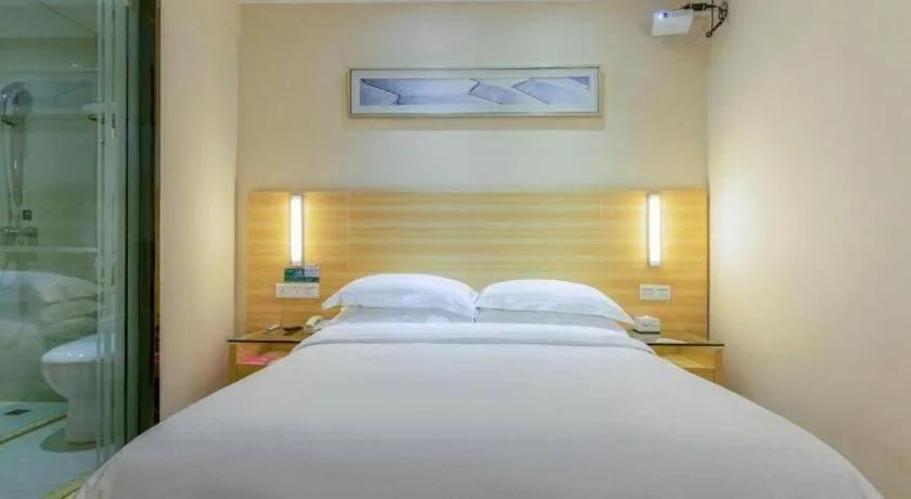 Bed in City Comfort Inn Zhongshan Xiaolan Xinduhui Gymnasium