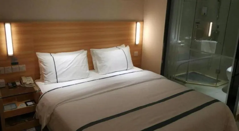 Bed in City Comfort Inn Zhongshan Xiaolan Xinduhui Gymnasium