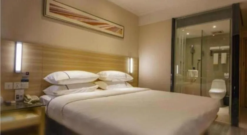 Bed in City Comfort Inn Zhongshan Xiaolan Xinduhui Gymnasium