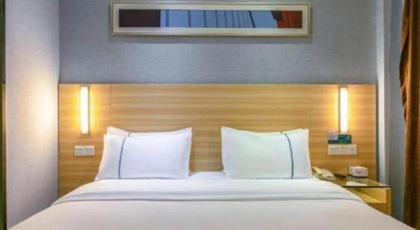 Bed in City Comfort Inn Zhongshan Xiaolan Xinduhui Gymnasium