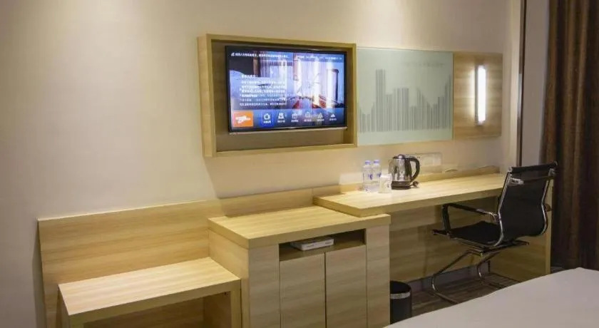 Bed in City Comfort Inn Zhongshan Xiaolan Xinduhui Gymnasium