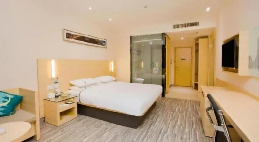 Bed in City Comfort Inn Zhongshan Xiaolan Xinduhui Gymnasium
