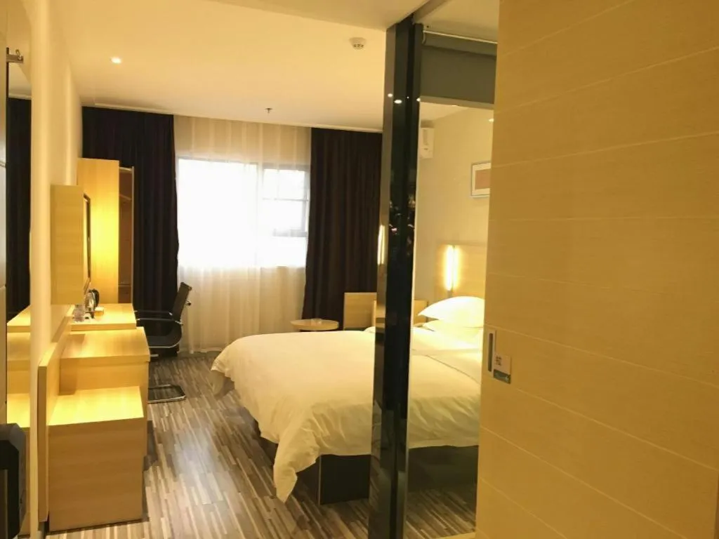 Bed in City Comfort Inn Zhongshan Xiaolan Xinduhui Gymnasium