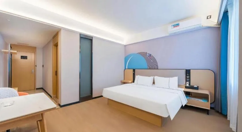 Bed in City Comfort Inn Huanggang Wuxue Bus Center