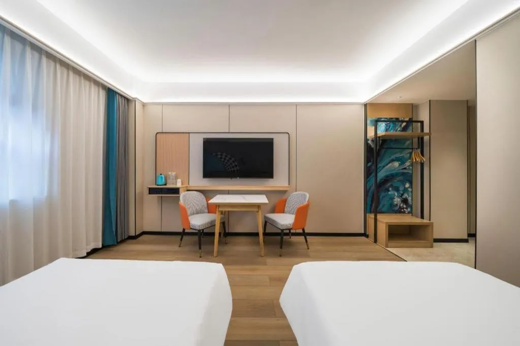 Bed in City Comfort Inn Huanggang Wuxue Bus Center