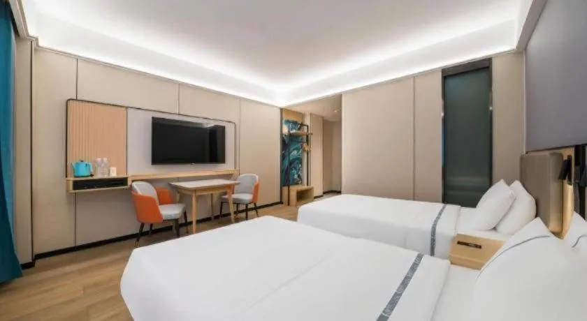 Bed in City Comfort Inn Huanggang Wuxue Bus Center