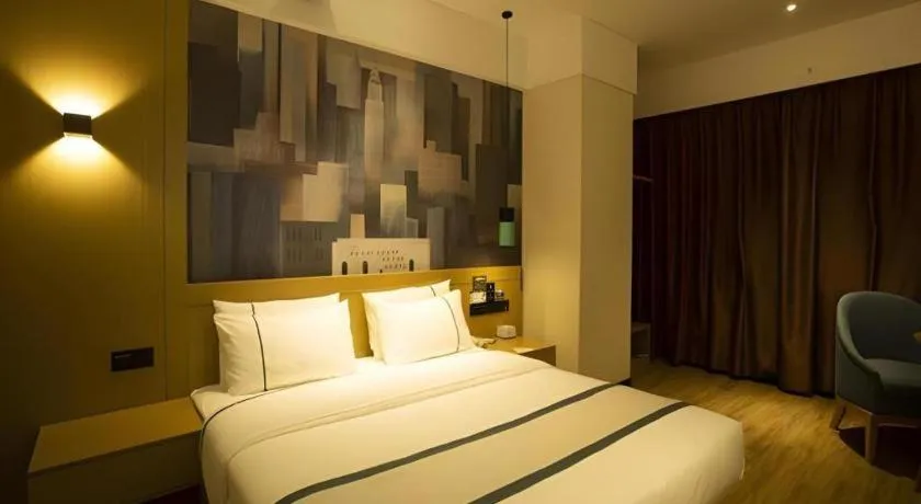 Bed in City Comfort Inn Huanggang Wuxue Bus Center