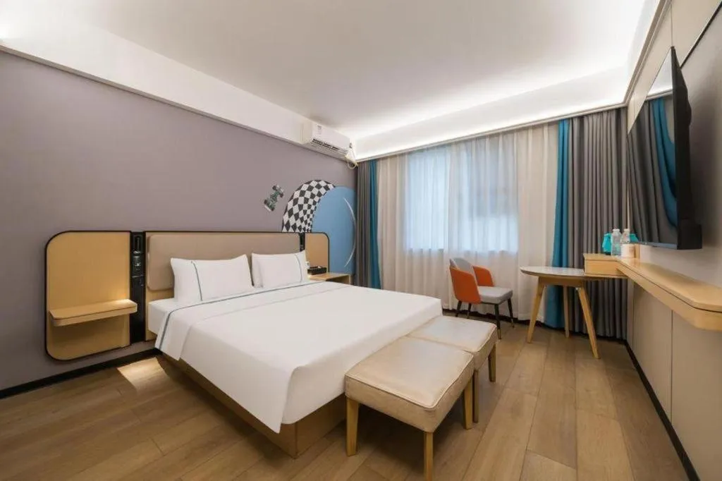 Bed in City Comfort Inn Huanggang Wuxue Bus Center