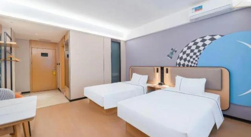 Bed in City Comfort Inn Huanggang Wuxue Bus Center