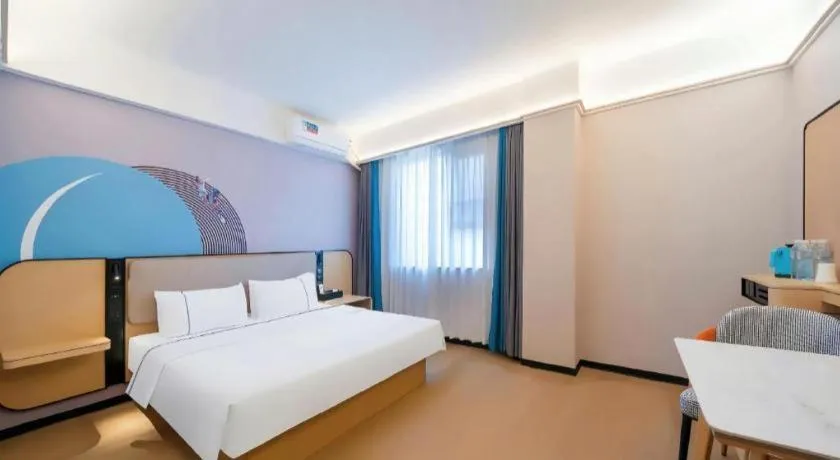 Bed in City Comfort Inn Huanggang Wuxue Bus Center