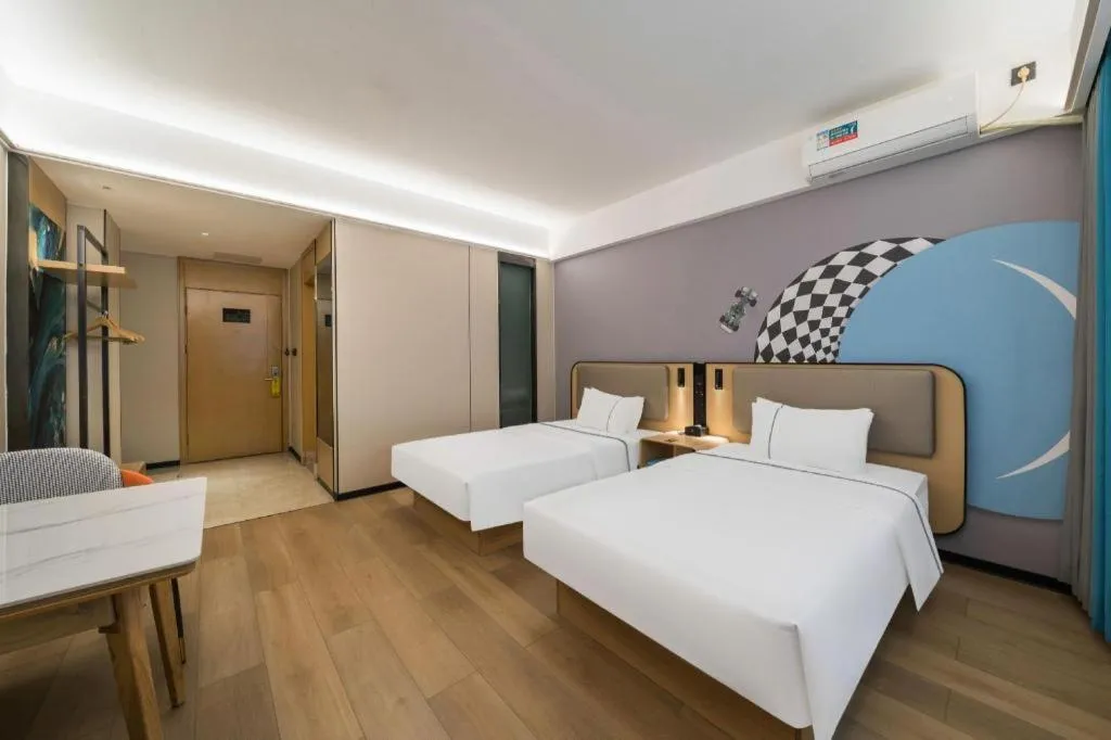 Bed in City Comfort Inn Huanggang Wuxue Bus Center