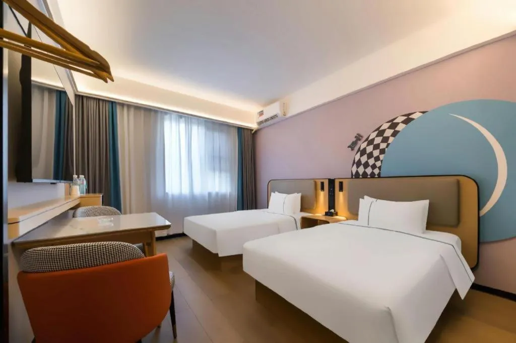 Bed in City Comfort Inn Huanggang Wuxue Bus Center