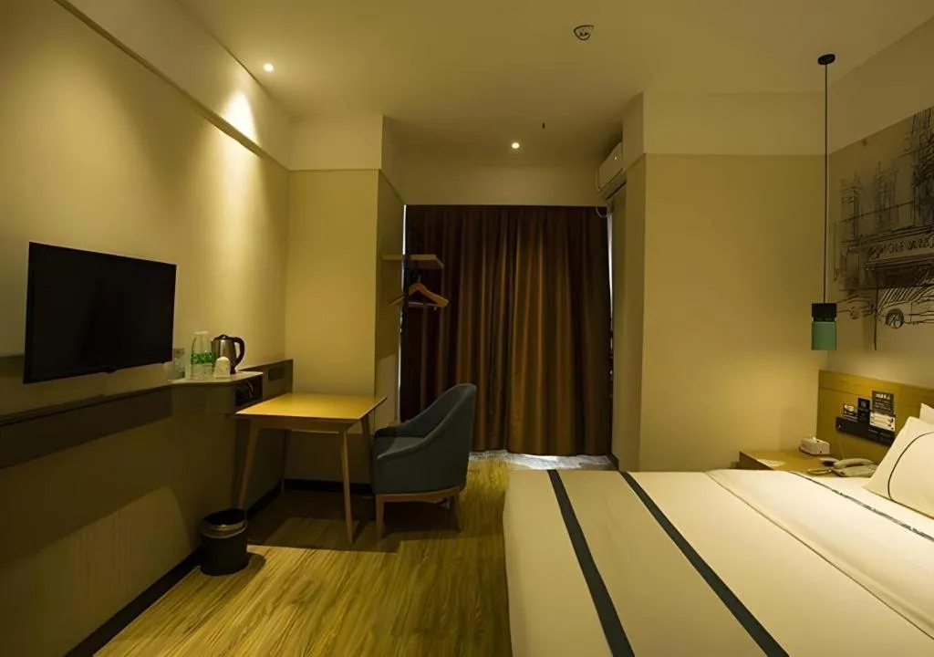 Bed in City Comfort Inn Huanggang Wuxue Bus Center