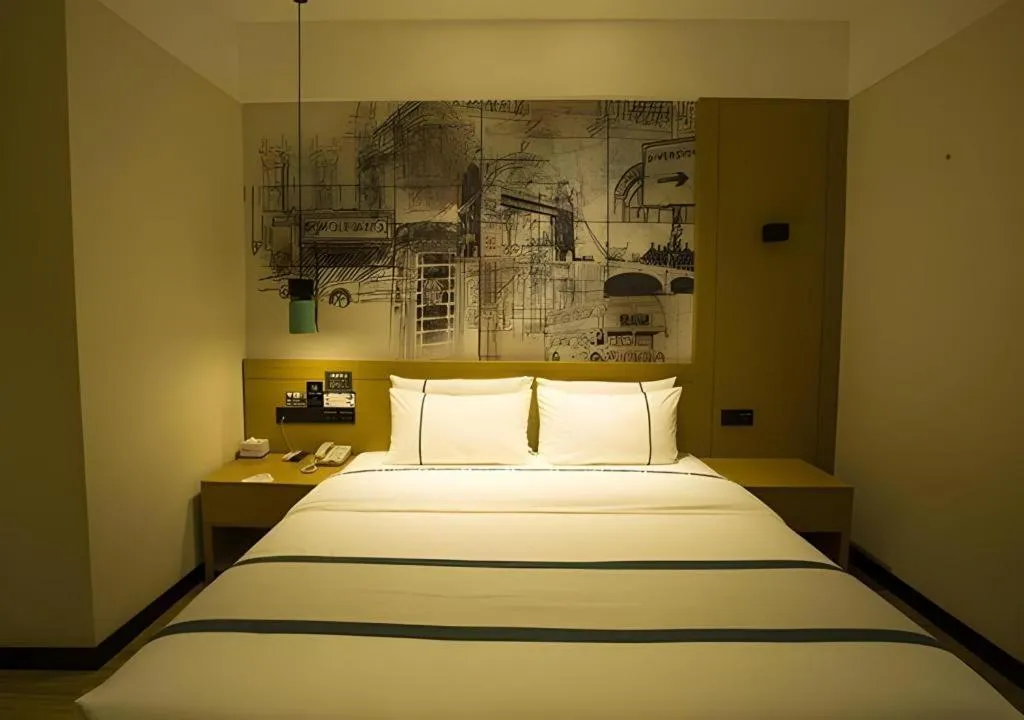 Bed in City Comfort Inn Huanggang Wuxue Bus Center