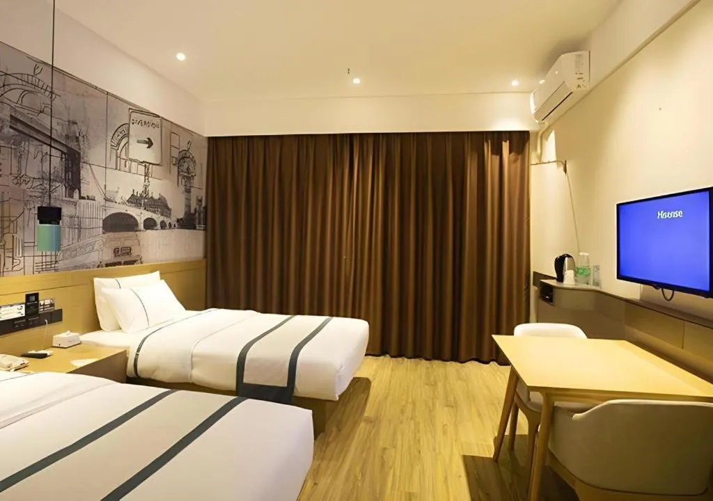 Bed in City Comfort Inn Huanggang Wuxue Bus Center