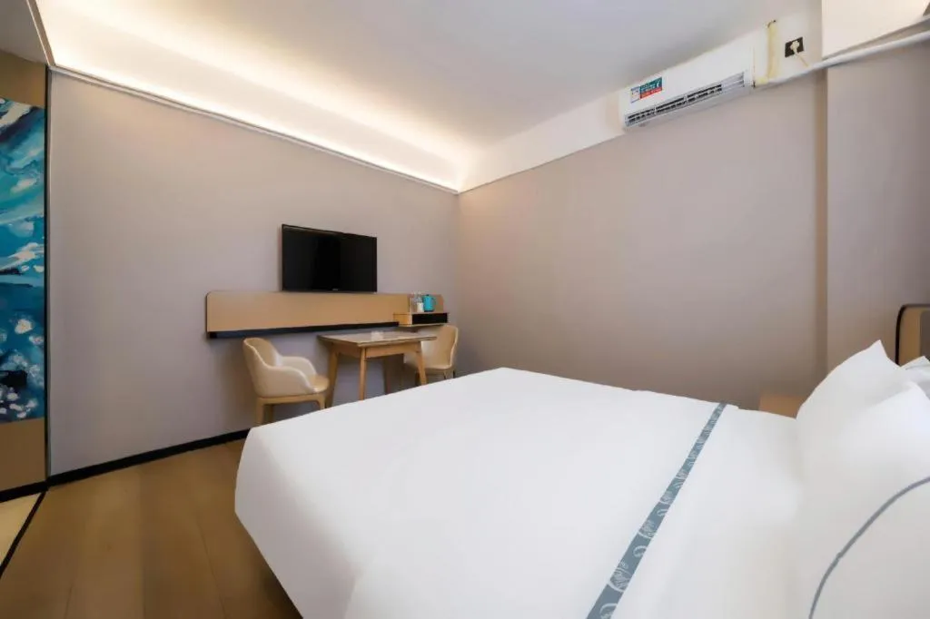 Bed in City Comfort Inn Huanggang Wuxue Bus Center