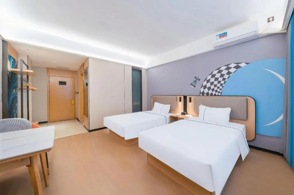 Bed in City Comfort Inn Huanggang Wuxue Bus Center