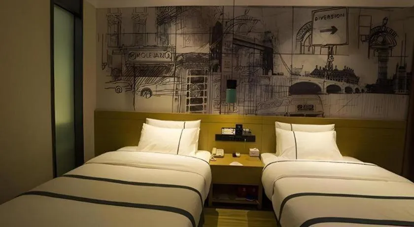 Bed in City Comfort Inn Huanggang Wuxue Bus Center