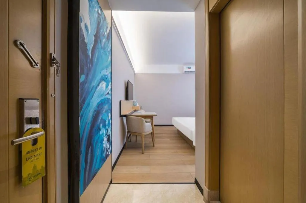 Bed in City Comfort Inn Huanggang Wuxue Bus Center