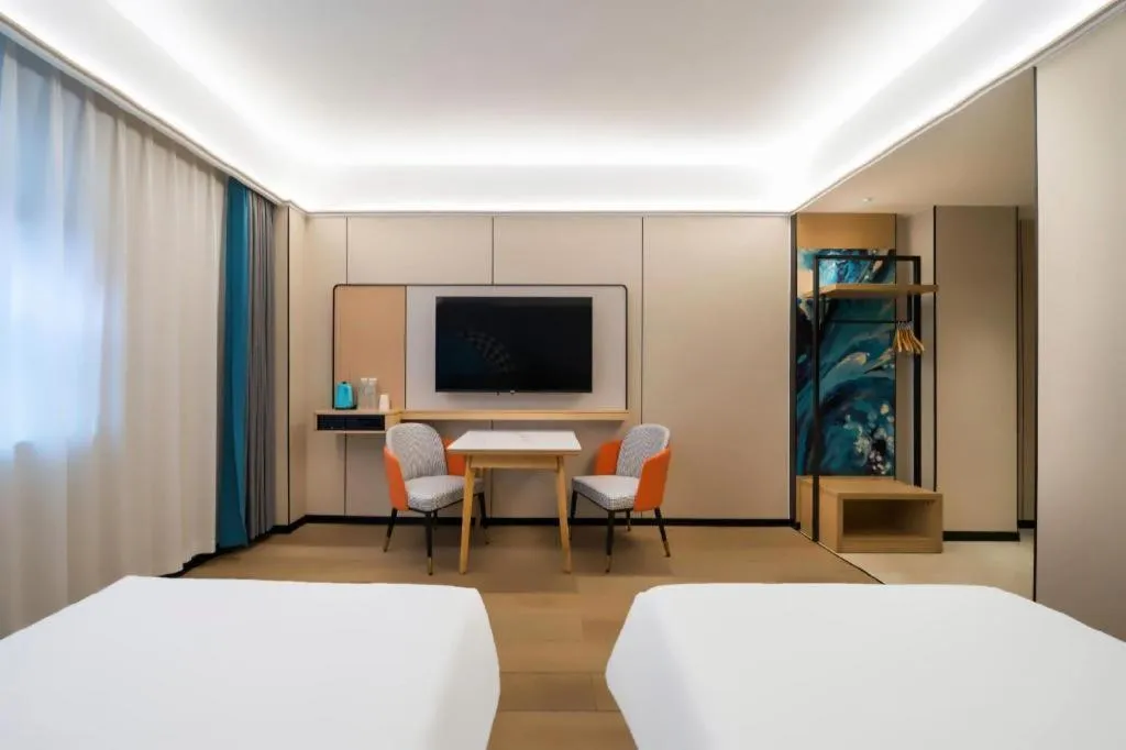 Bed in City Comfort Inn Huanggang Wuxue Bus Center