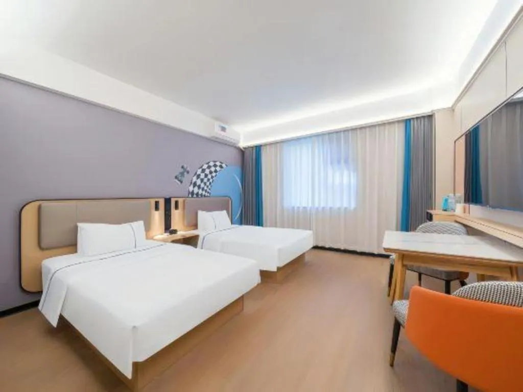 Bed in City Comfort Inn Huanggang Wuxue Bus Center