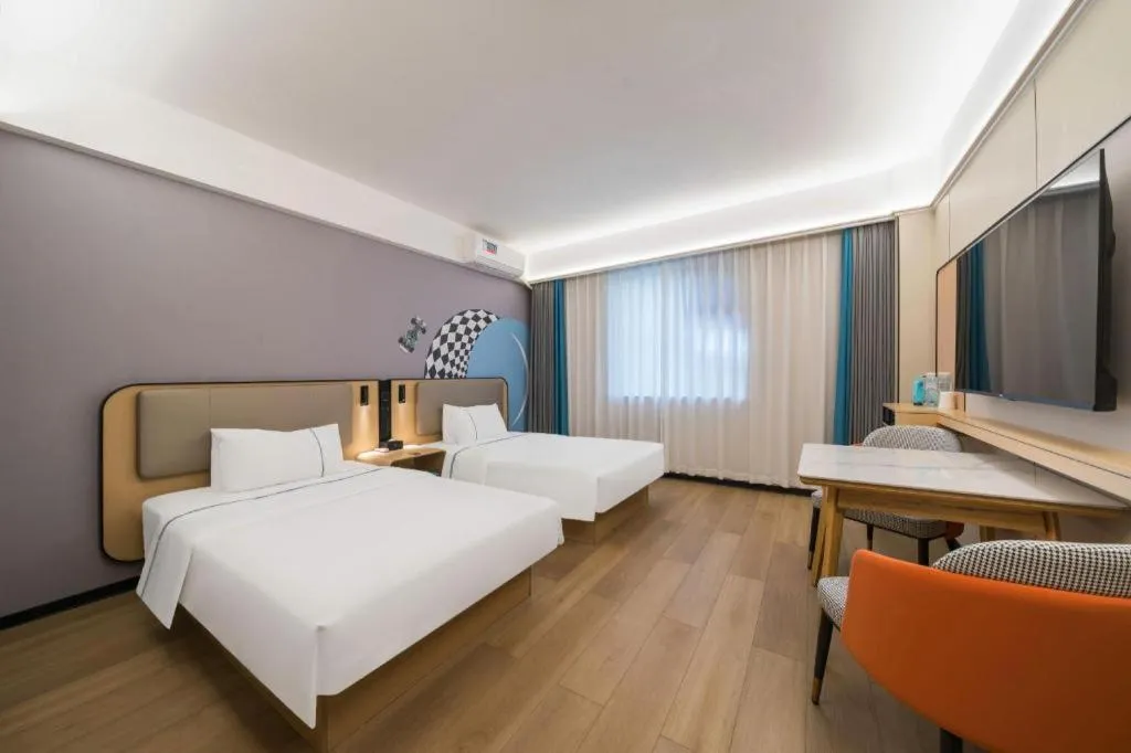 Bed in City Comfort Inn Huanggang Wuxue Bus Center