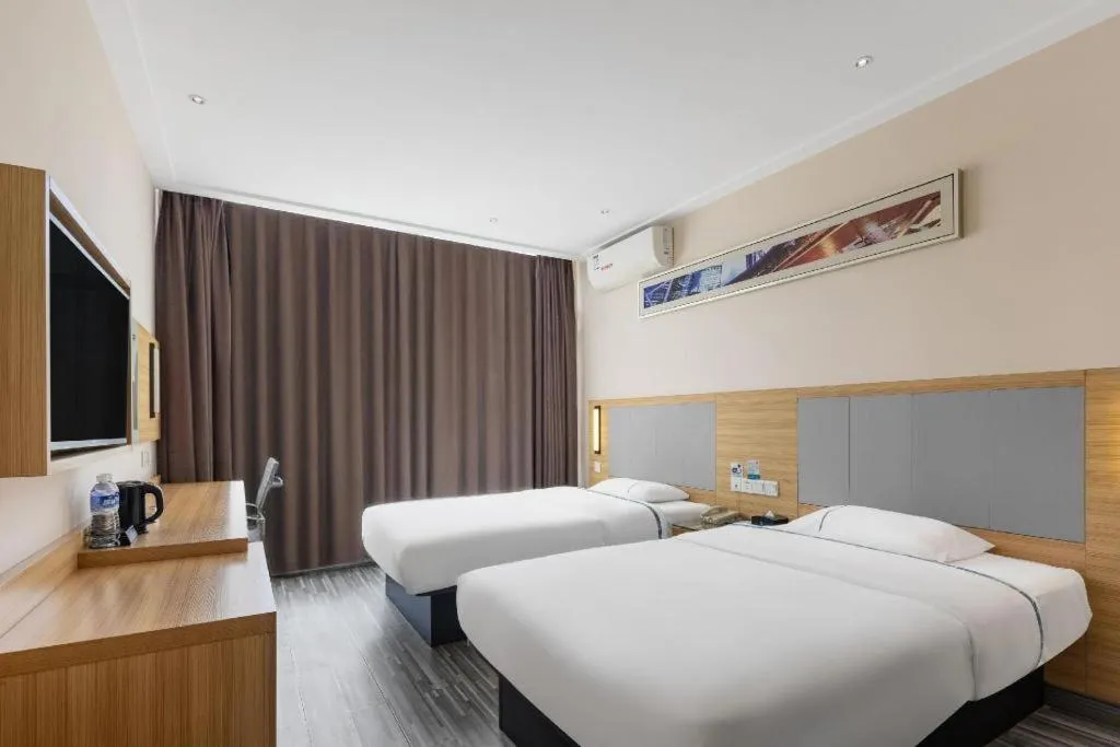 Bed in City Comfort Inn Zhanjiang Seaside Park Guanhai Corridor