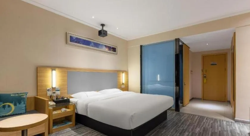Bed in City Comfort Inn Zhanjiang Seaside Park Guanhai Corridor