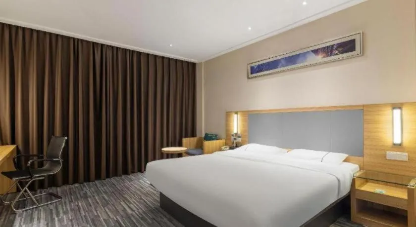 Bed in City Comfort Inn Zhanjiang Seaside Park Guanhai Corridor