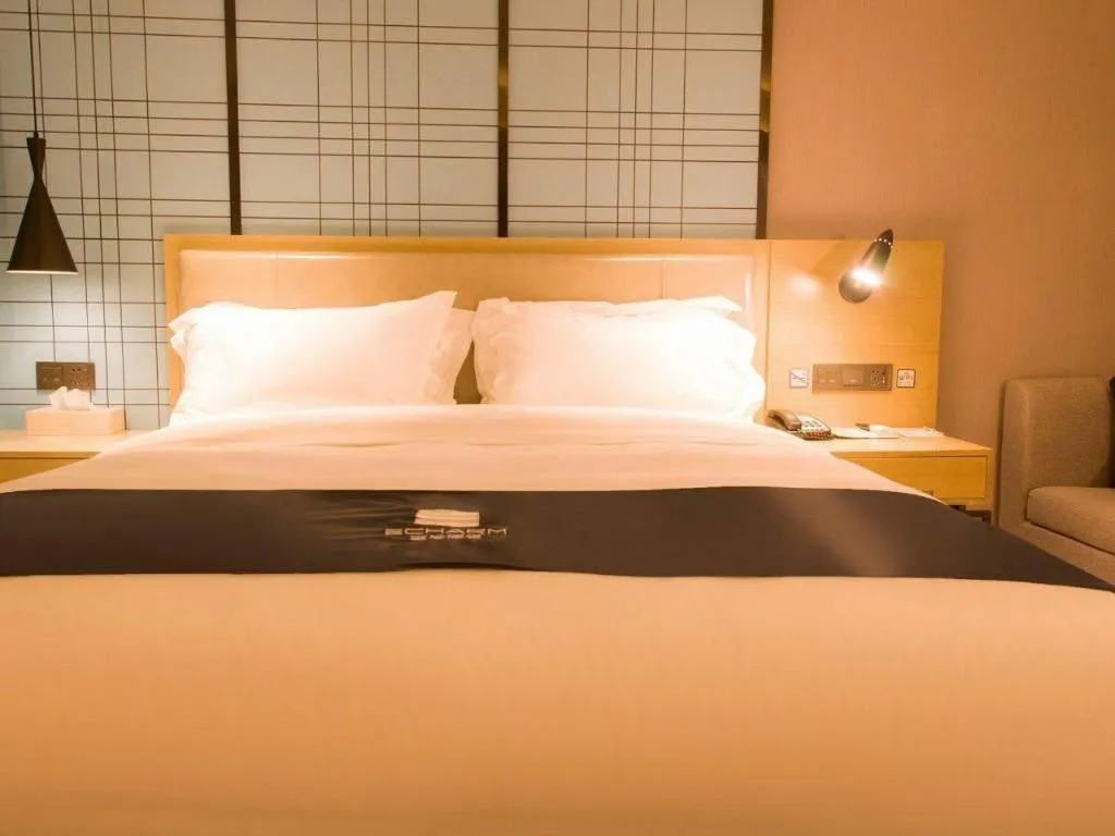 Bed in Echarm Hotel Huangshi Yingbin Avenue