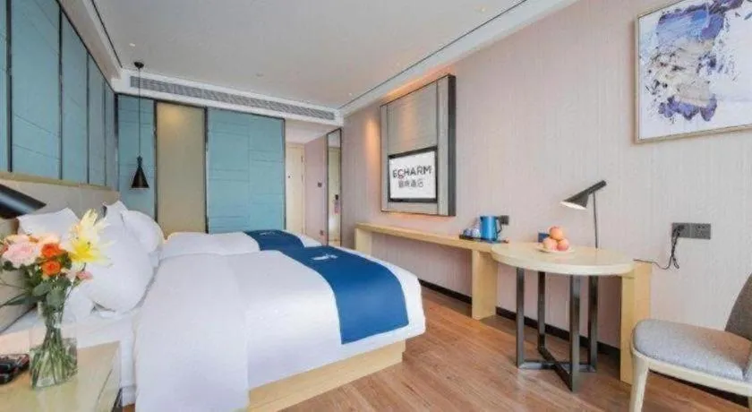 Bed in Echarm Hotel Huangshi Yingbin Avenue