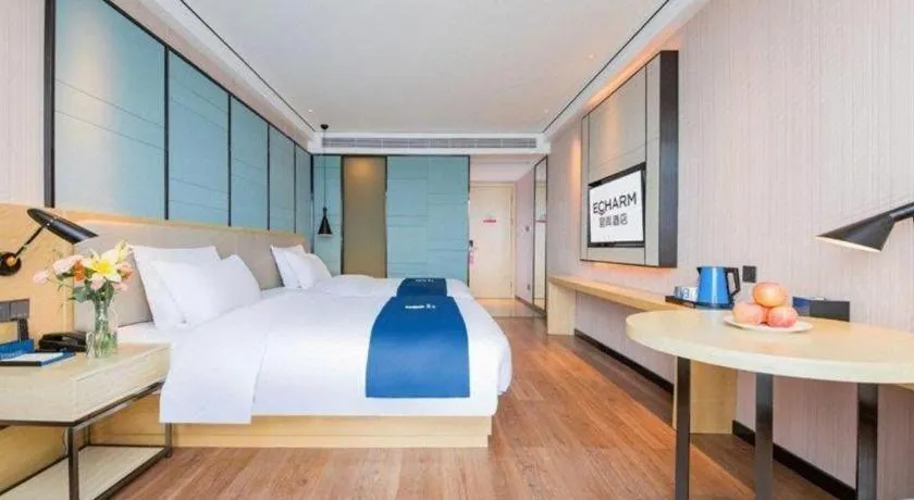 Bed in Echarm Hotel Huangshi Yingbin Avenue