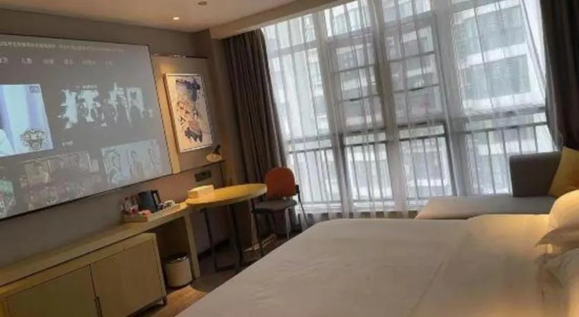 Bed in Echarm Hotel Huangshi Yingbin Avenue