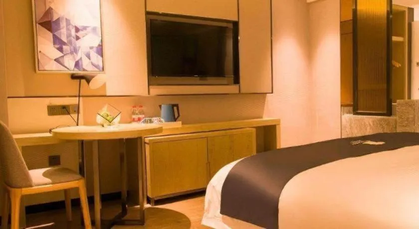 Bed in Echarm Hotel Huangshi Yingbin Avenue